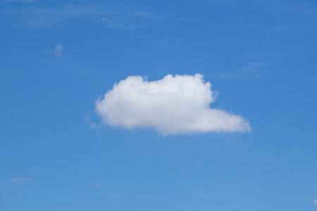 Blue sky background with tiny clouds, Nature cloud blue sky background, Blue Sky with Fluffy White Clouds on a Sunny Summer Dayの写真素材