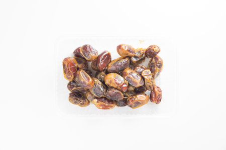 Sweet fresh dates on white background, Dried dates fruit on white backgroundの写真素材