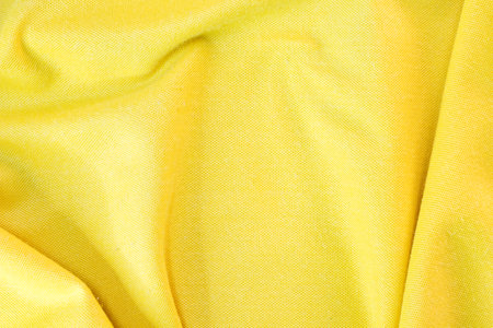 Abstract fabric background, Yellow fabric cloth background, texture of crumpled Yellow fabric backgroundの写真素材