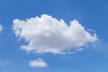Blue sky background with tiny clouds, Nature cloud blue sky background, Blue Sky with Fluffy White Clouds on a Sunny Summer Dayの写真素材