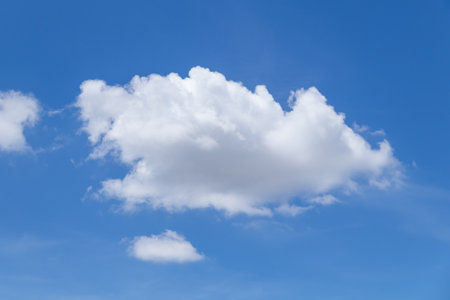 Blue sky background with tiny clouds, Nature cloud blue sky background, Blue Sky with Fluffy White Clouds on a Sunny Summer Dayの写真素材