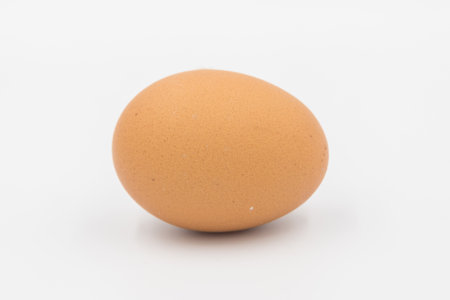 Chicken eggs on white background,  egg isolated on the white background, Close-up view of raw chicken eggs, chicken egg isolated on white background, Raw eggs on white backgroundの写真素材
