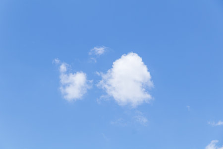 Blue sky background with tiny clouds, Nature cloud blue sky background, Blue Sky with Fluffy White Clouds on a Sunny Summer Dayの写真素材