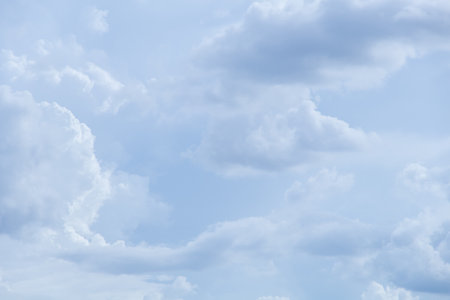Blue sky background with tiny clouds, Nature cloud blue sky background, Blue Sky with Fluffy White Clouds on a Sunny Summer Dayの写真素材