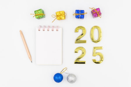 Gold 2025 numerals on a white background. 2025 New Years Eve Celebration, Holiday background Happy New Year 2025. Numbers of year 2025, celebrating New Year holiday, Space for textの写真素材