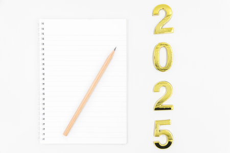 Gold 2025 numerals on a white background. 2025 New Years Eve Celebration, Holiday background Happy New Year 2025. Numbers of year 2025, celebrating New Year holiday, Space for textの写真素材