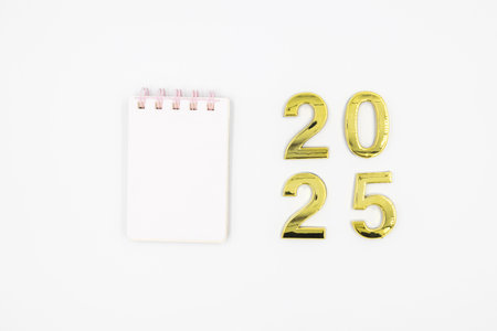 Gold 2025 numerals on a white background. 2025 New Years Eve Celebration, Holiday background Happy New Year 2025. Numbers of year 2025, celebrating New Year holiday, Space for textの写真素材