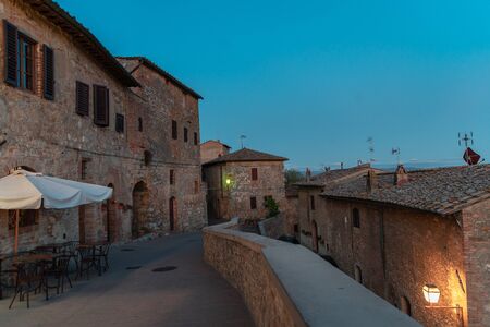 Ancient houses in the beautiful town San Gimignanoの写真素材