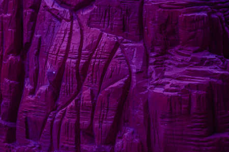 Dark mountain texture in purple color backgroundの写真素材
