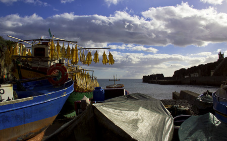 Fishing boats in landの写真素材