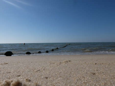 A sandy beach on a sunny day on Penang Island, Malaysiaの写真素材