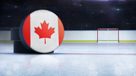 hockey puck with Canada flag side cover on ice rink with spectators background, hockey arena indoor 3D render as national illustration backgroundの写真素材