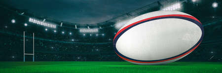 Sport stadium with rugby ball at night as wide backdrop. Digital 3D illustration for background advertisement.の写真素材