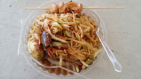 A papaya salad and a Pleurotus eryngii mushroom grill from Yasothorn provinceの写真素材