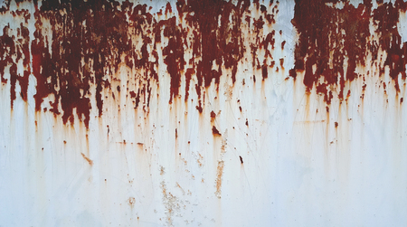 Rusty on white iron gates/plate that had been left to decay of a house in the city. abstract background textureの写真素材
