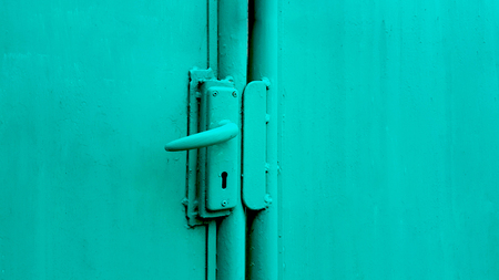 Green door knob on the green doorの写真素材