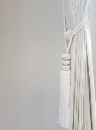 holding strap for a curtain with brushes close upの写真素材