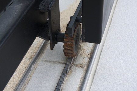 Cog wheels , that controls the opening and closing gates