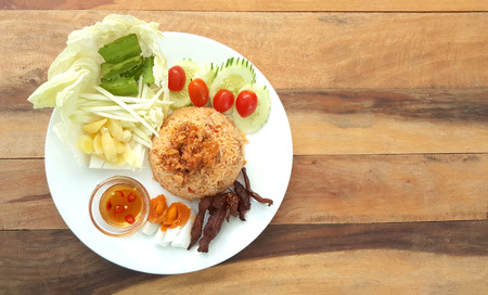 rice with fried mackerel boil egg shrimp paste chili sauce and vetgetable and pig fried  original thai foodの写真素材