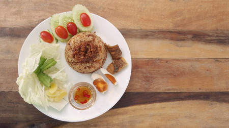 rice with fried mackerel boil egg shrimp paste chili sauce and vetgetable and fish fry  original thai foodの写真素材