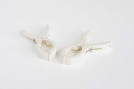 Clothespin isolated on white backgroundの写真素材