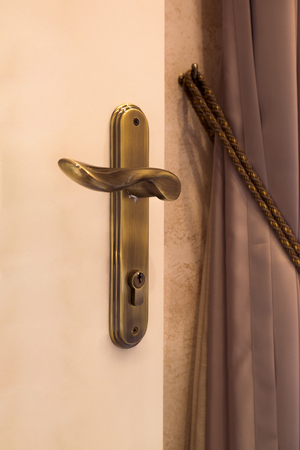 Vintage door handle with keyholeの写真素材