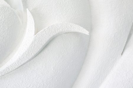 Decorative white cement wall background of abstract waves.の写真素材