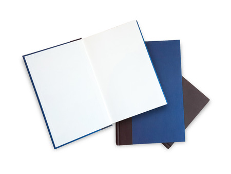 The blue hardcover book is open on a white backgroundの写真素材