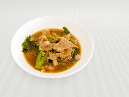Fried noodle with pork and broccoli and stir the water to thicken.の写真素材