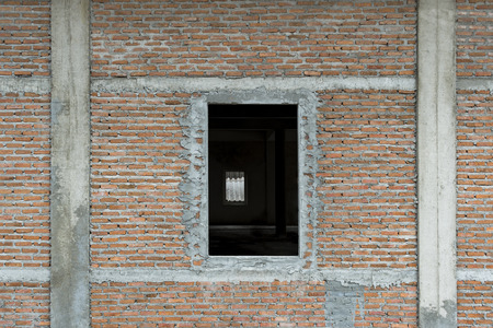 Red brick building structure is fragile. Horizontal Wide Brickwall Background.