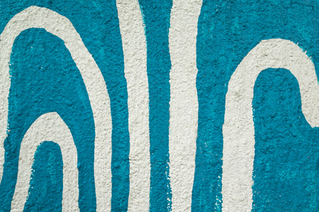 Colorful Abstract white lines on blue wall background. Wavy background. Interior wall decoration.