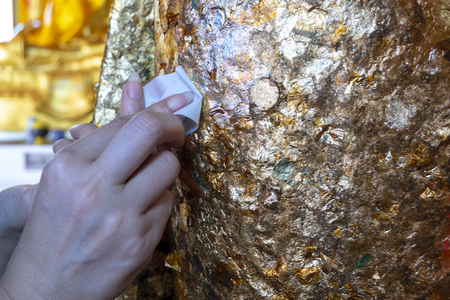 Texture of the gold leaf,  Picture from Buddha image Back, gold leaf backgroundの写真素材