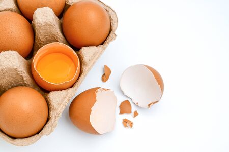 Broken egg isolated on white backgroundの写真素材
