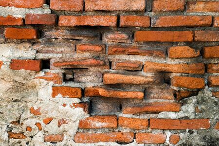 Old red brick wall bracket for background.の写真素材