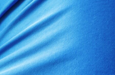 blue fabric texture, cloth background, Solid fabrics for backs and pillows. Blue silk draperyの写真素材
