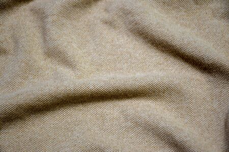 Elegant Beige cotton fabric texture background. fabric crumpled background, Abstract background, empty template. close upの写真素材