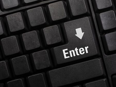 Close up of Enter key of Laptop computer. Enter keyboard key button on a computer. Selective focus.の写真素材