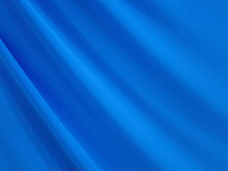 Texture background template. Silk color light blue background is a shiny light blue waveの写真素材