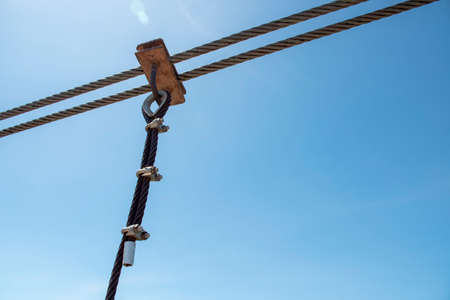 Sling of the bridge, The steel rope of the suspension bridge and the blue sky backgroundの写真素材