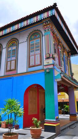 Colorful House in little India with Skyscraper in the back, Singaporeの写真素材