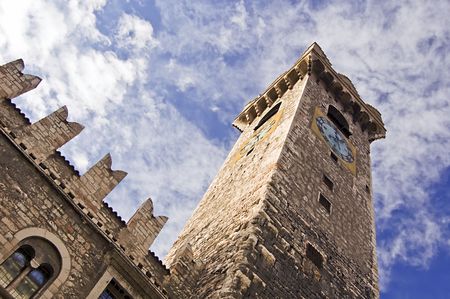Medieval tower with clock of a caste in Trento (Italy)