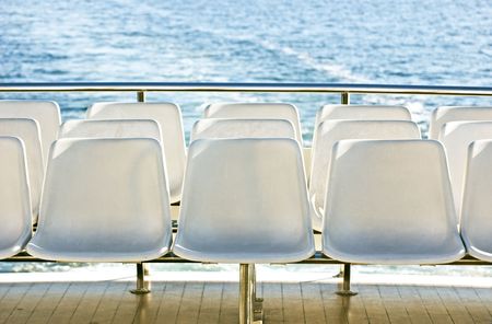White seats on a tourist boatの写真素材
