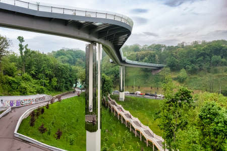 Aerial view from drone, early foggy morning, pedestrian-bicycle bridge in Kievの写真素材