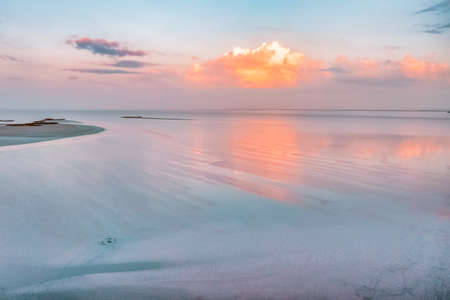 Amazing aerial view of the pink lake, at sunset, beautiful landscape, juicy multi-colored colorsの写真素材