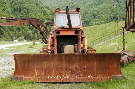 An old tractor in a valley