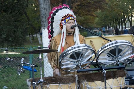 native american playing music on the streets