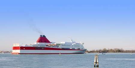 A medium cruise ship in venice, italyの写真素材