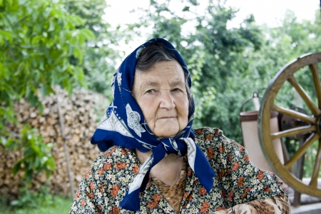 Portrait of a romanian old woman in the countrysideの写真素材