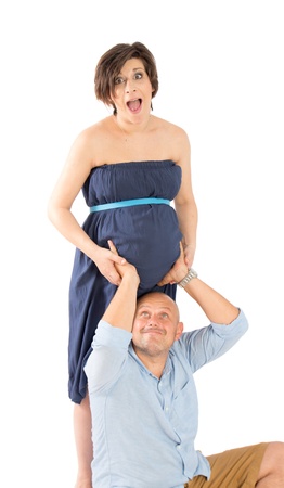 A family waiting baby having fun at studioの写真素材