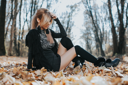 Beautiful woman posing in the forestの写真素材